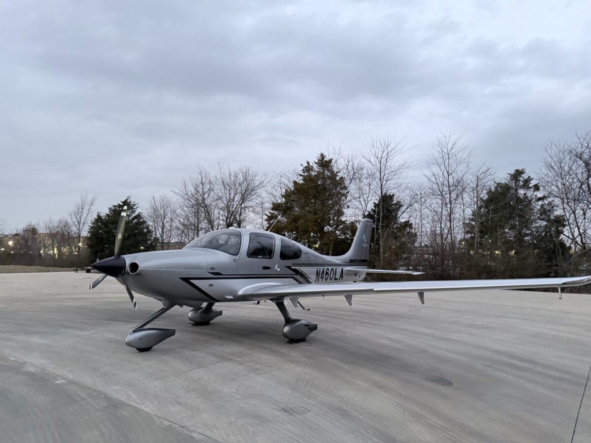 Side view of Lipson Aviation 2026 Cirrus SR20 G7+ N460LA parked outside