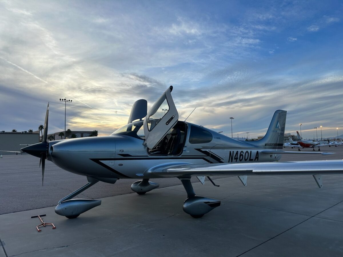 2026 Cirrus SR20 G7+ N460LA parked on the ramp at sunset with the pilot door open